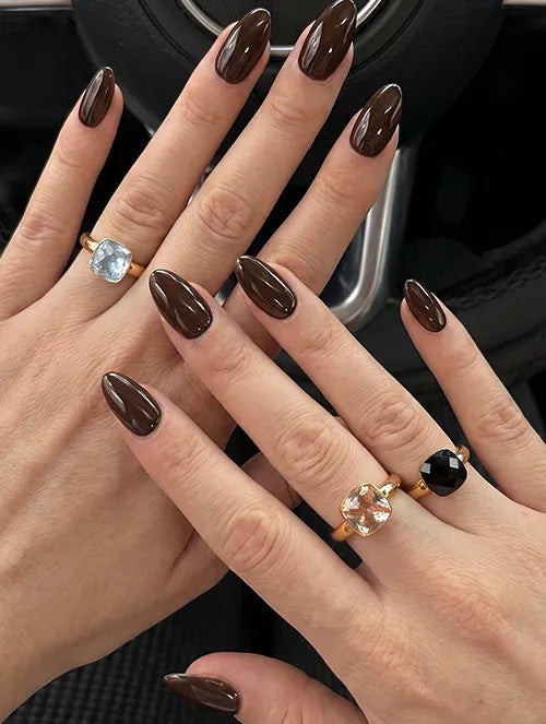 Anillo Facetado de Acero Quirúrgico con Baño Dorado y Cristal Champagne